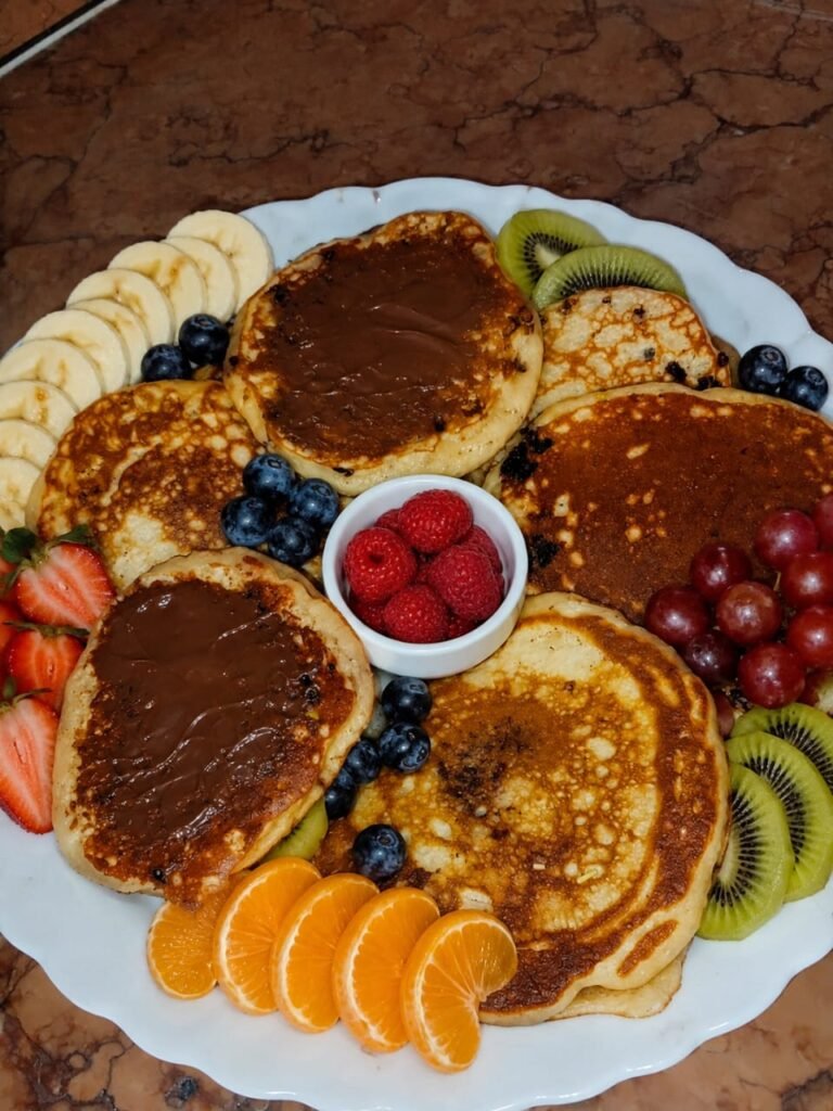 Easy pancakes recipe with fluffy soft pancakes served with fresh fruit