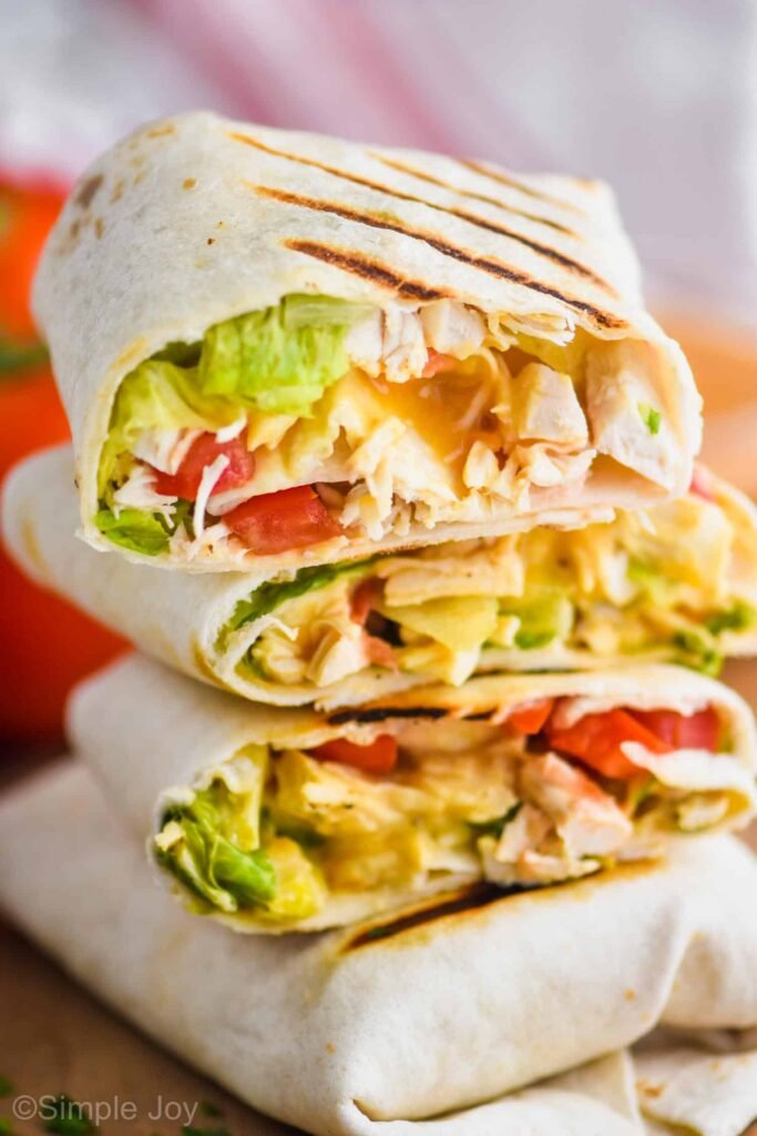 Healthy chicken wrap withgrilled chicken, fresh vegetables, and creamy sauce